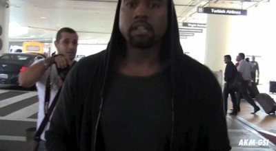 kanye-attacks-paparazzi-at-lax